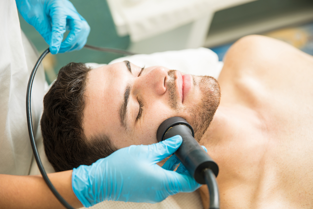 Closeup,Of,A,Handsome,Young,Man,Getting,Facial,Rejuvenation,Therapy